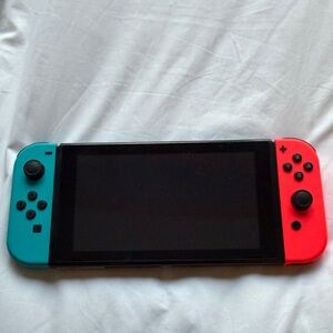 Nintendo 1 with hdmi and usb. Handheld Console - Blue and Red